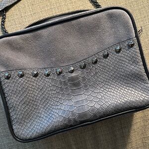 Gray leather crossbody bag with studs